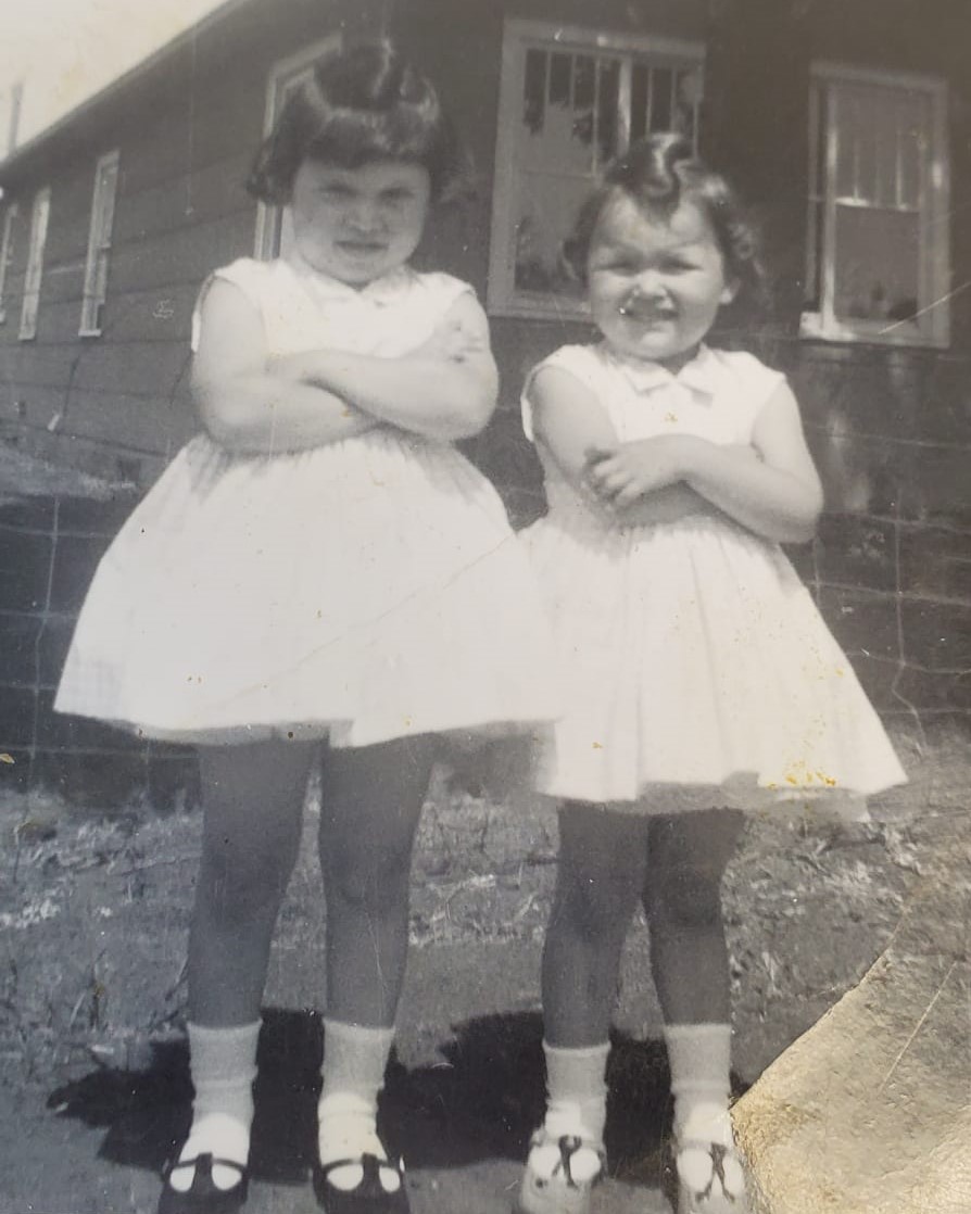 Sherry (right) and her big sister Darlene | A photo of Sherry and her big sister Darlene in foster care in Prince Albert, SK, in 1964. | Provided